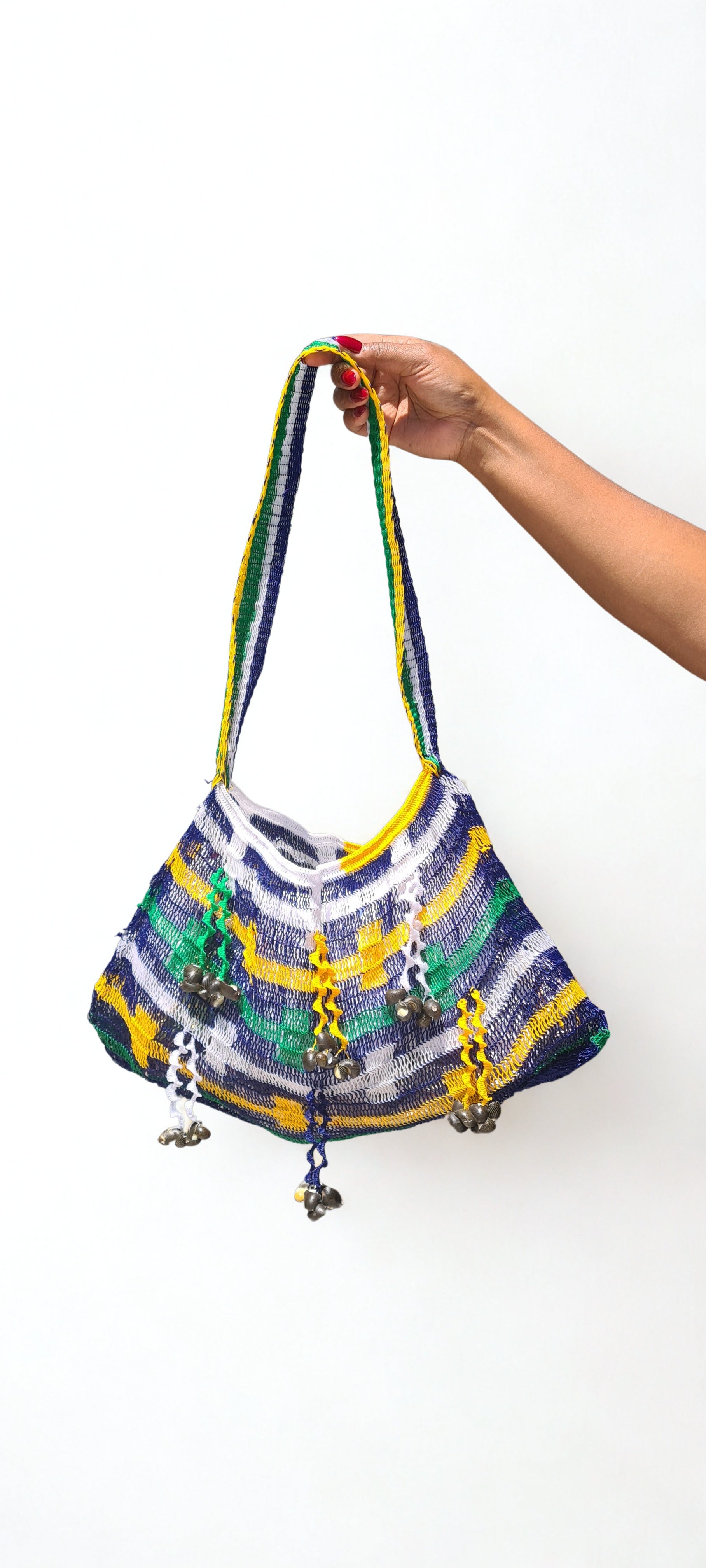 Handmade Morobe Nylon String Bilum Bag with Blue pattern on light background, Front view