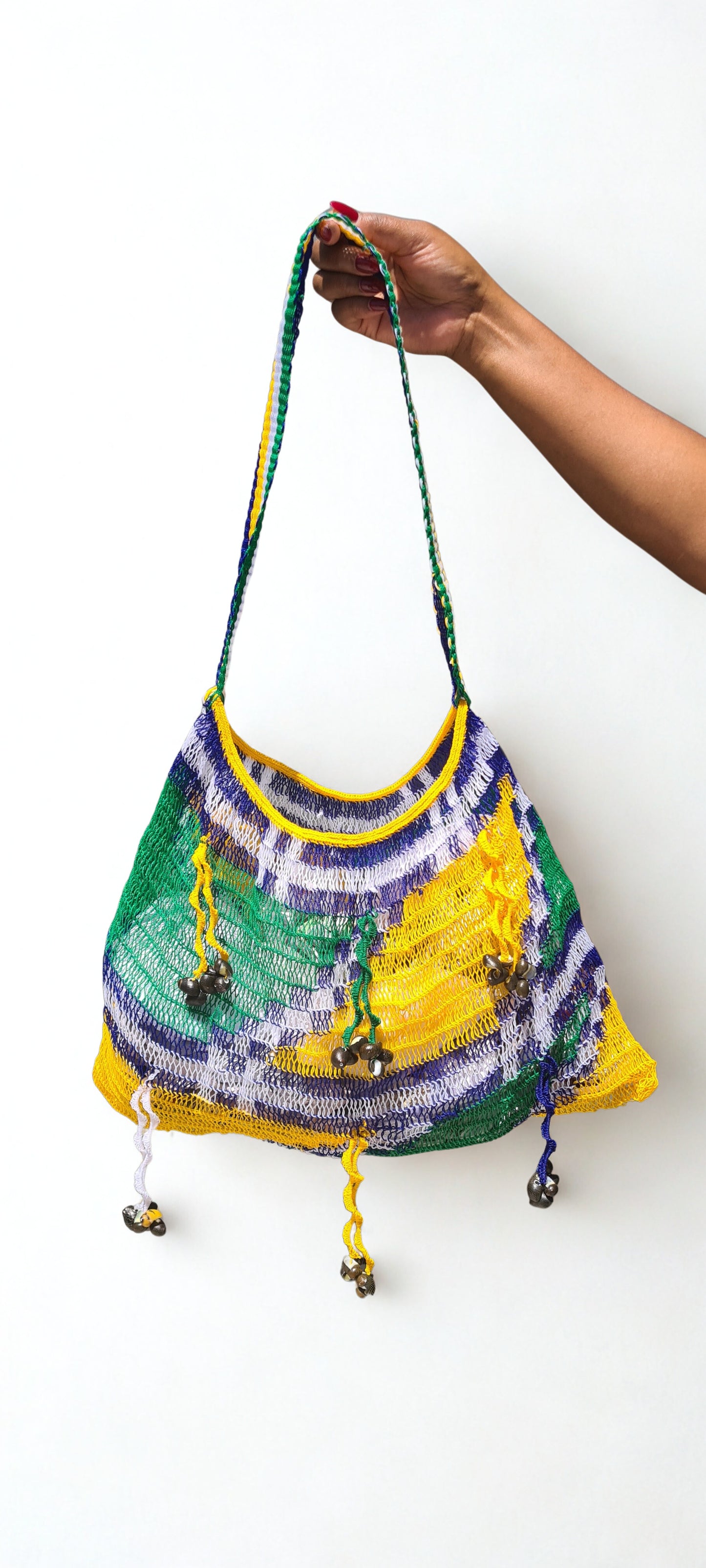 Handmade Morobe Nylon String Bilum Bag with Yellow and Green pattern on light background, Front view