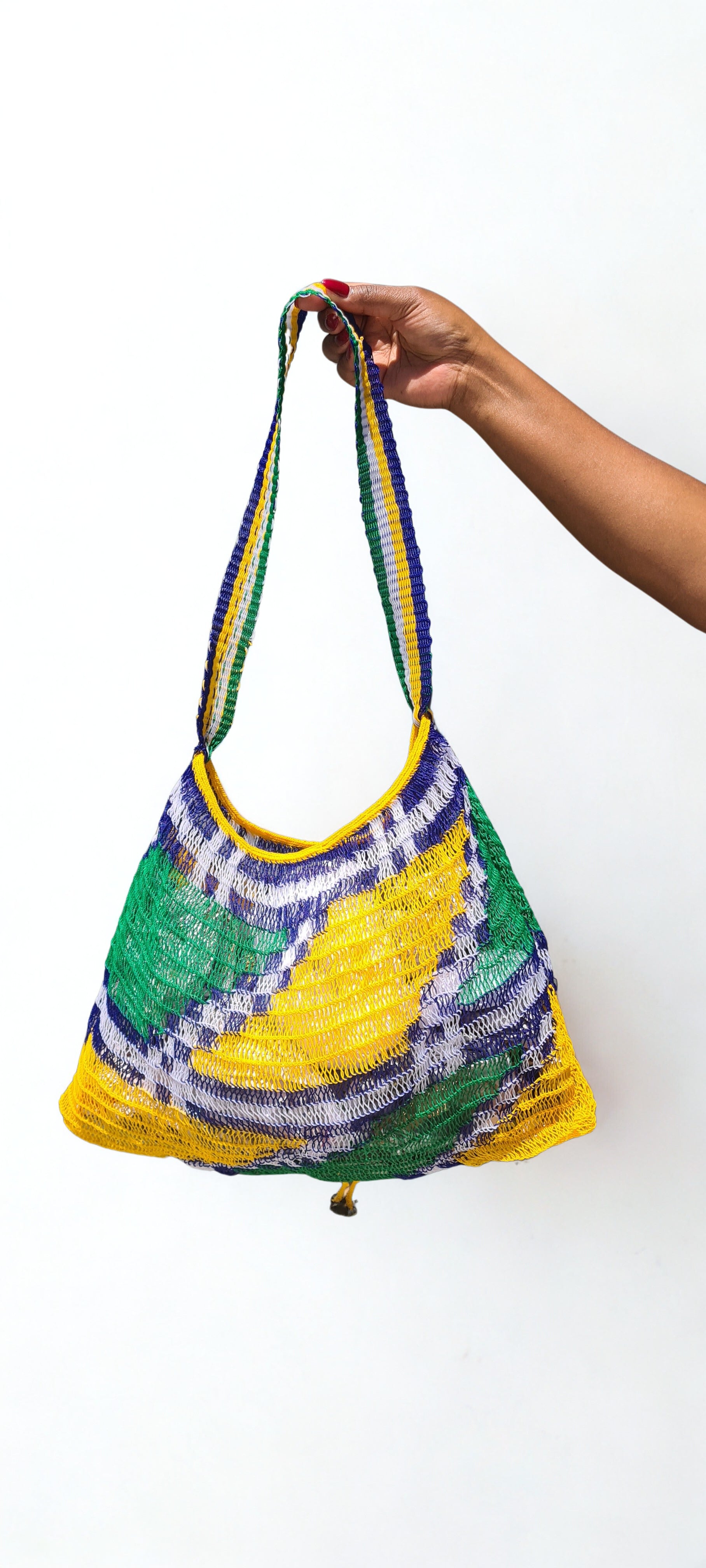 Handmade Morobe Nylon String Bilum Bag with Yellow and Green pattern on light background, Back view