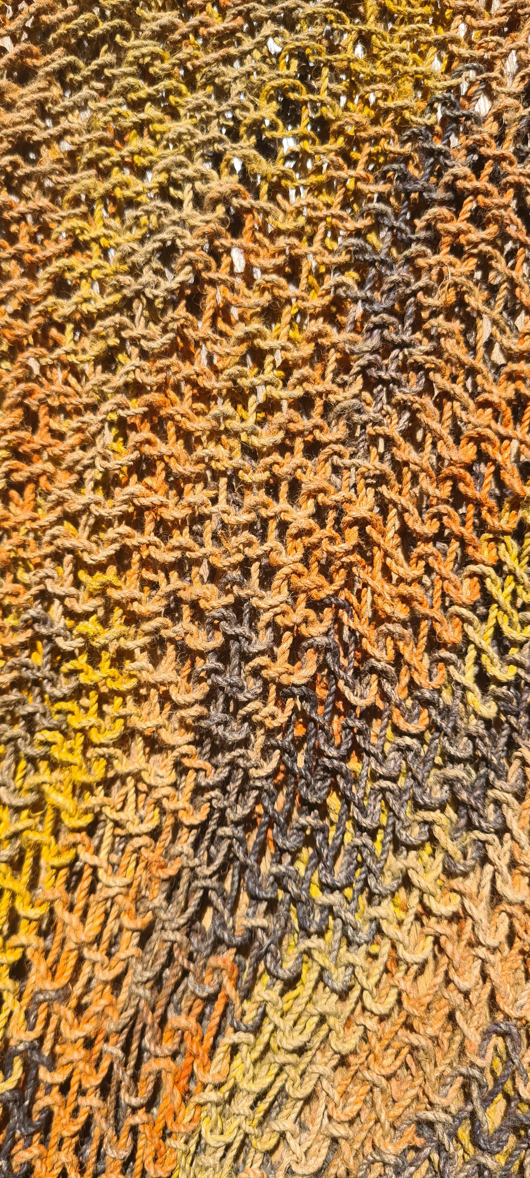 Handmade Natural Fibre Tulip Bilum Bag with Charcoal multicolour pattern on light background, Close Up view